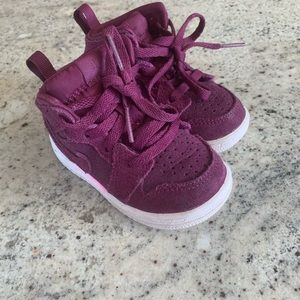 Nike Air Jordan’s, size 5C. Bordeaux color.